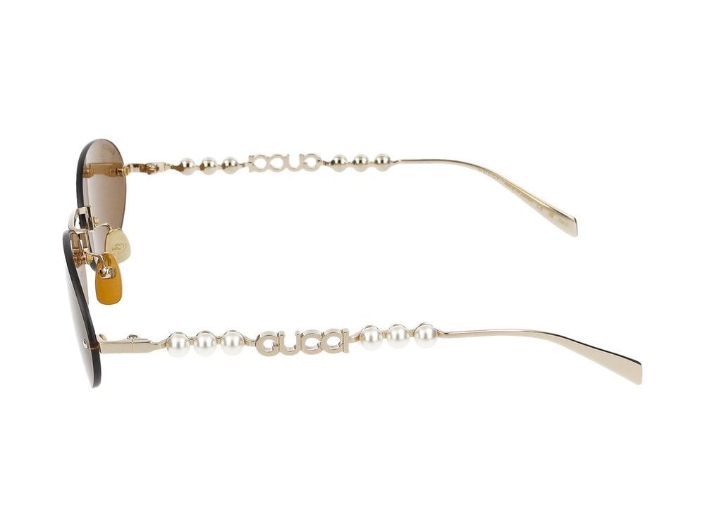 Gucci Gold Oval-Shaped Metal Frame Sunglasses Goud