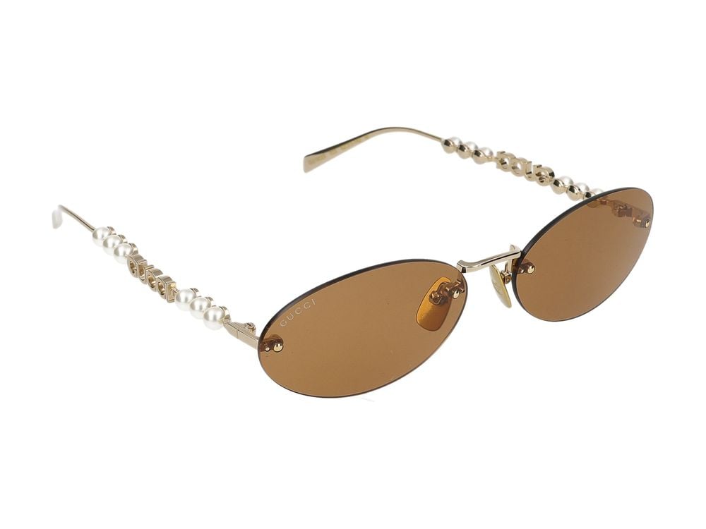 Gucci Gold Oval-Shaped Metal Frame Sunglasses Goud