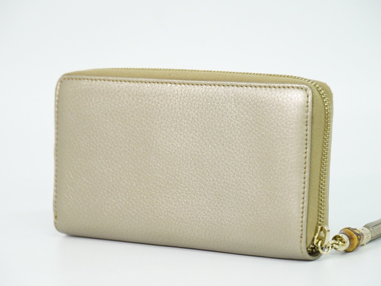 Gucci Bamboo Tassel Zip Leather Goud