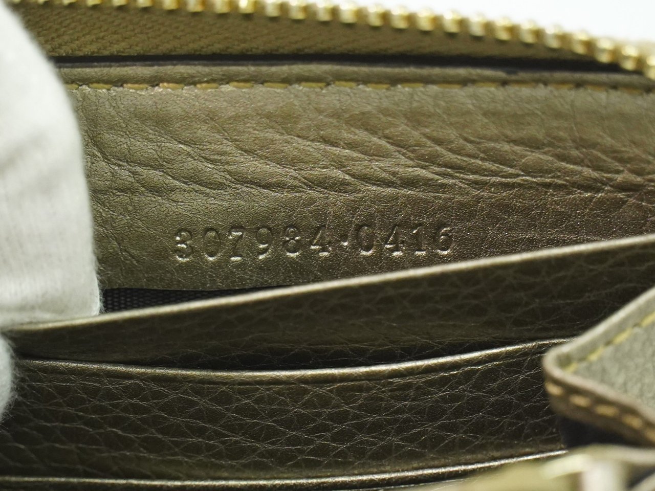 Gucci Bamboo Tassel Zip Leather Goud