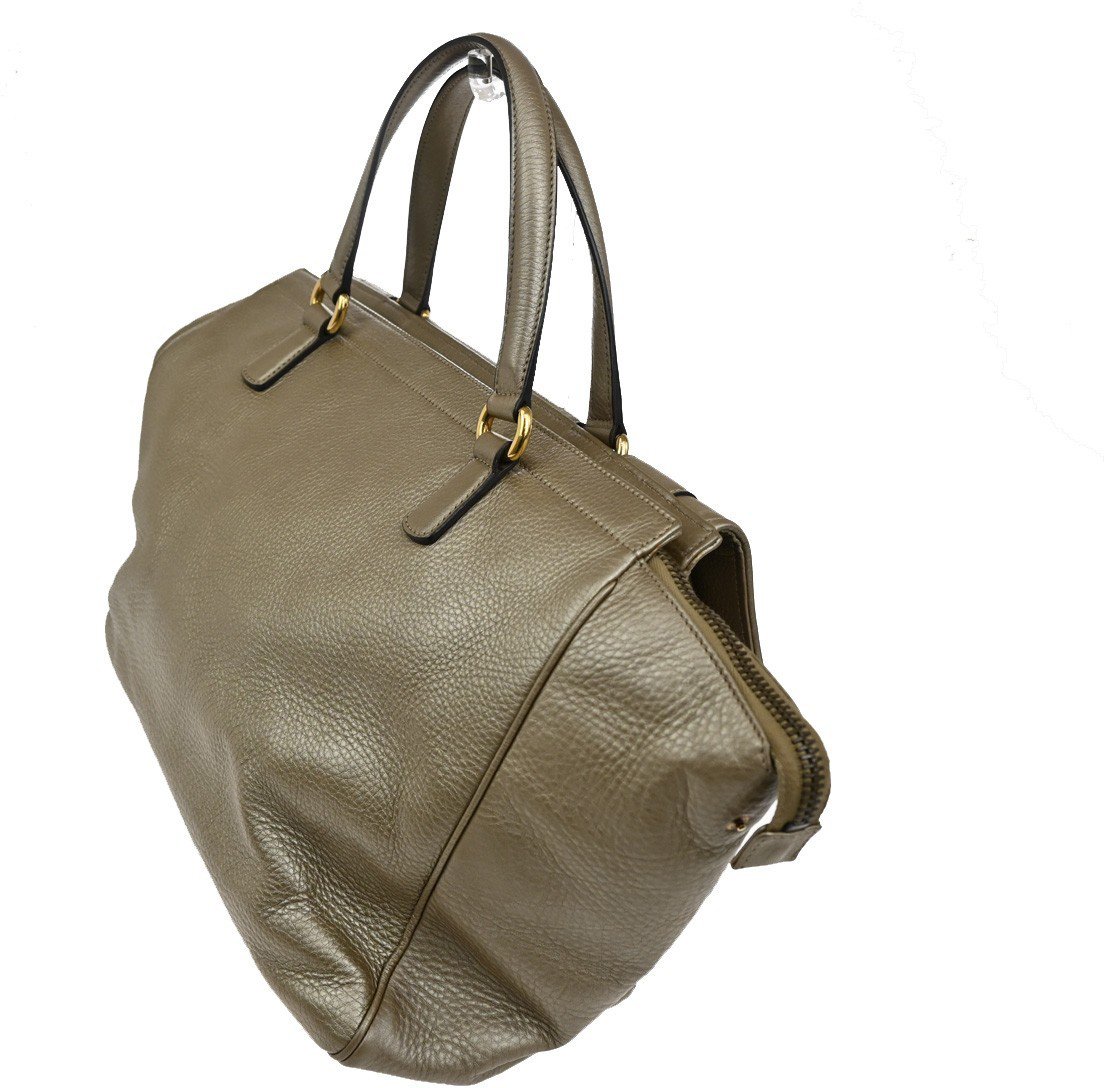 Gucci Gucci 1973 Top Handle Bag Leather Medium Goud