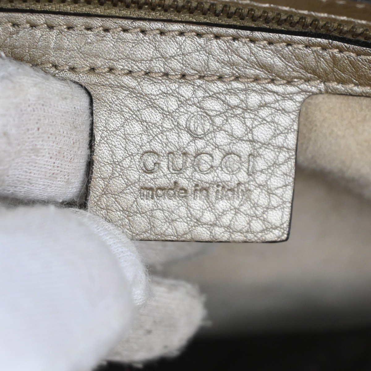 Gucci Gucci 1973 Top Handle Bag Leather Medium Goud