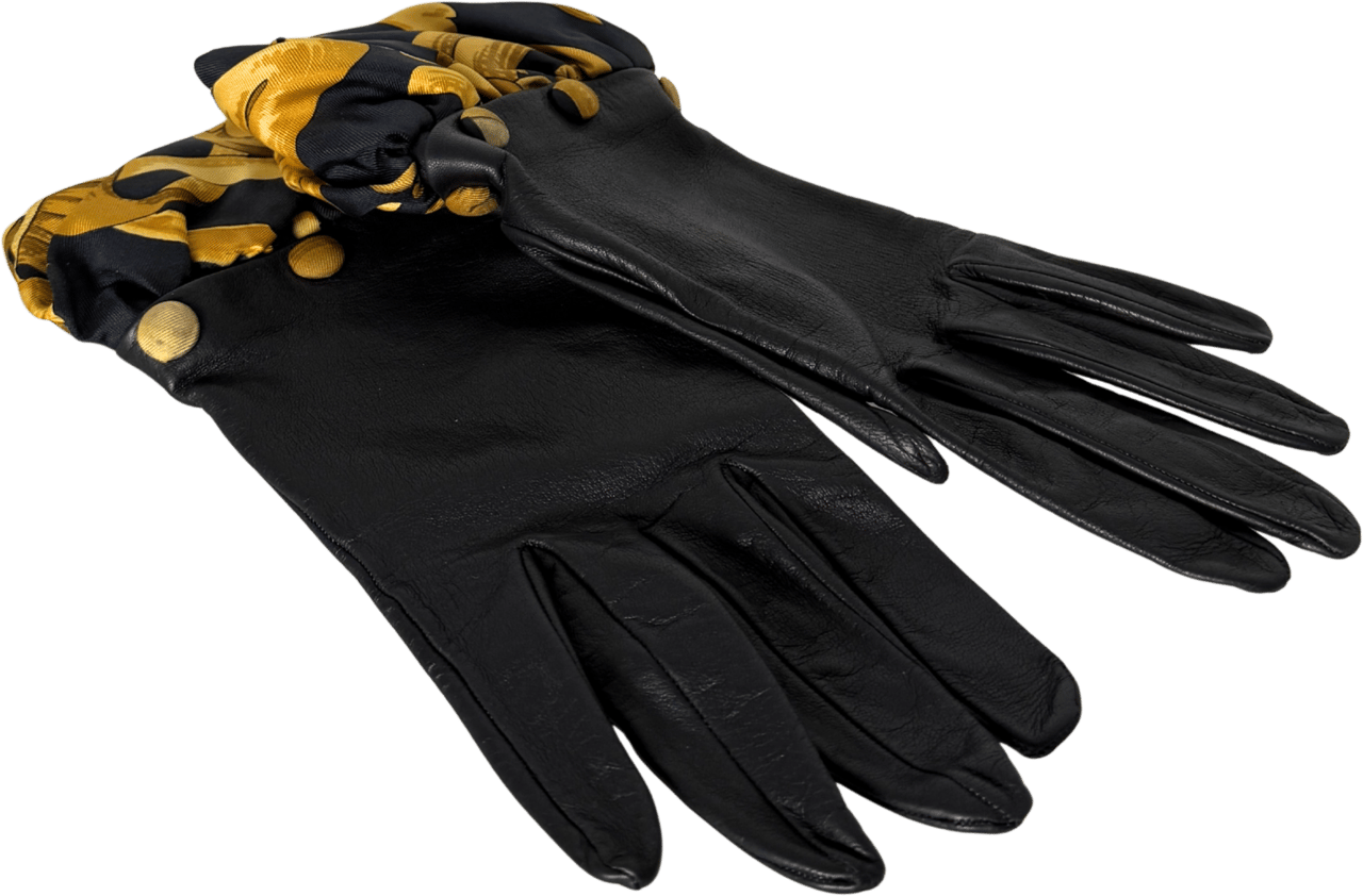 Hermès Hermès Lederhandschuhe mit Seidensaum Schwarz / neuwertig Zwart