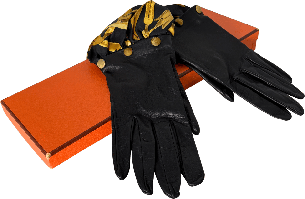 Hermès Hermès Lederhandschuhe mit Seidensaum Schwarz / neuwertig Zwart