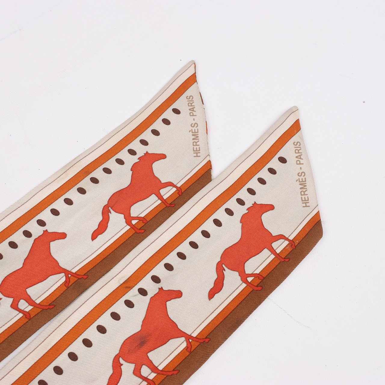Hermès Hermès Sequences Horse Twilly Scarves in Orange Oranje