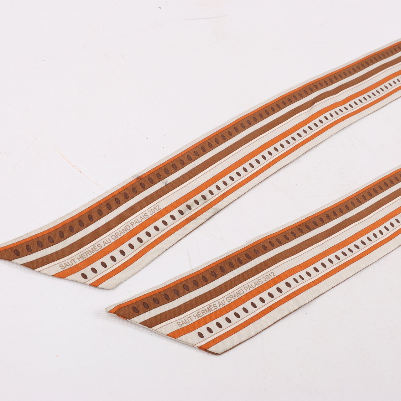 Hermès Hermès Sequences Horse Twilly Scarves in Orange Oranje