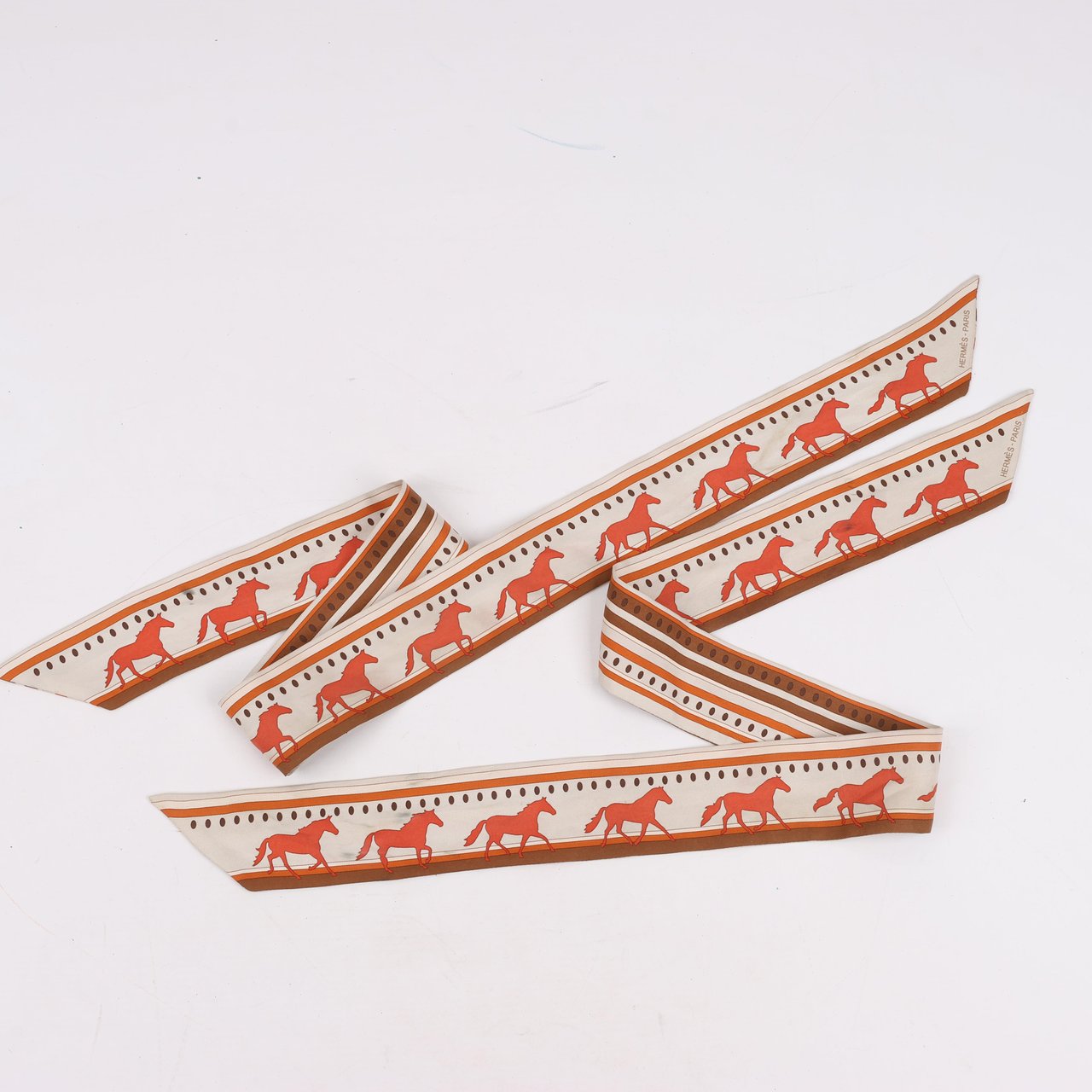 Hermès Hermès Sequences Horse Twilly Scarves in Orange Oranje