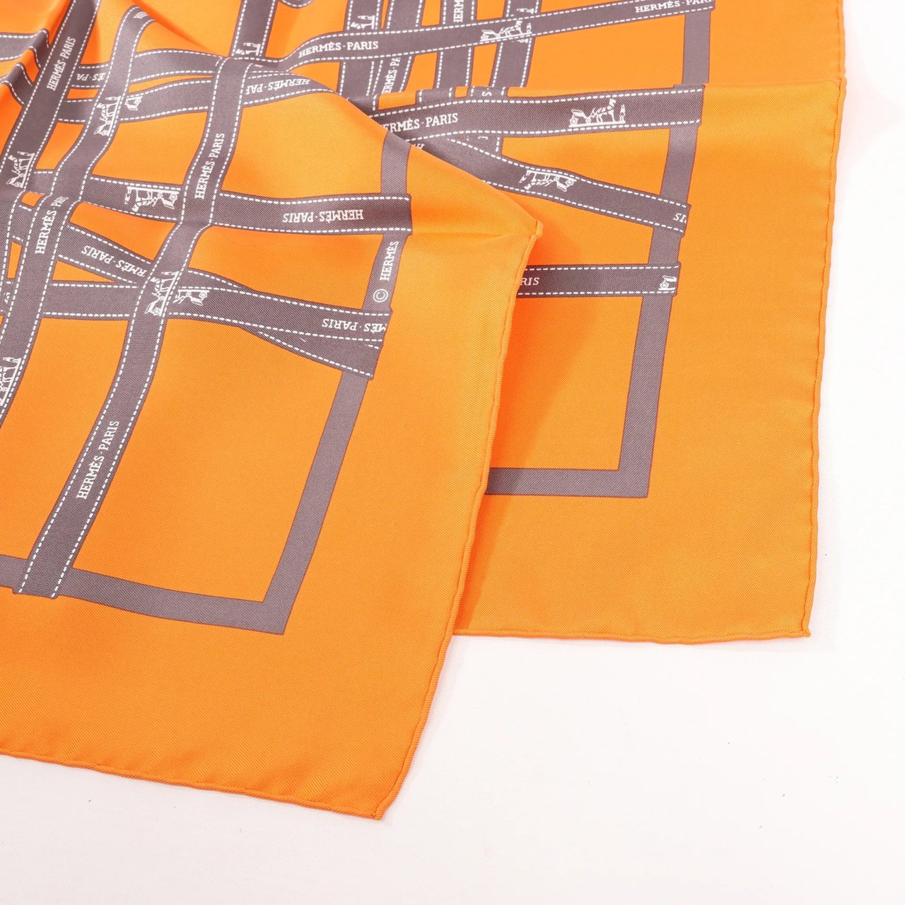 Hermès Hermès Carré 90 "Bolduc Ribbon" Silk handkerchief in Orange Oranje
