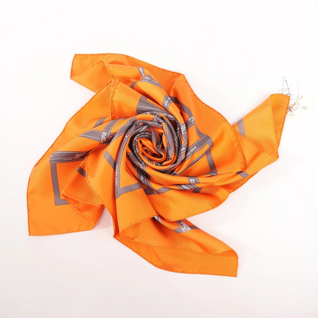 Hermès Hermès Carré 90 "Bolduc Ribbon" Silk handkerchief in Orange Oranje