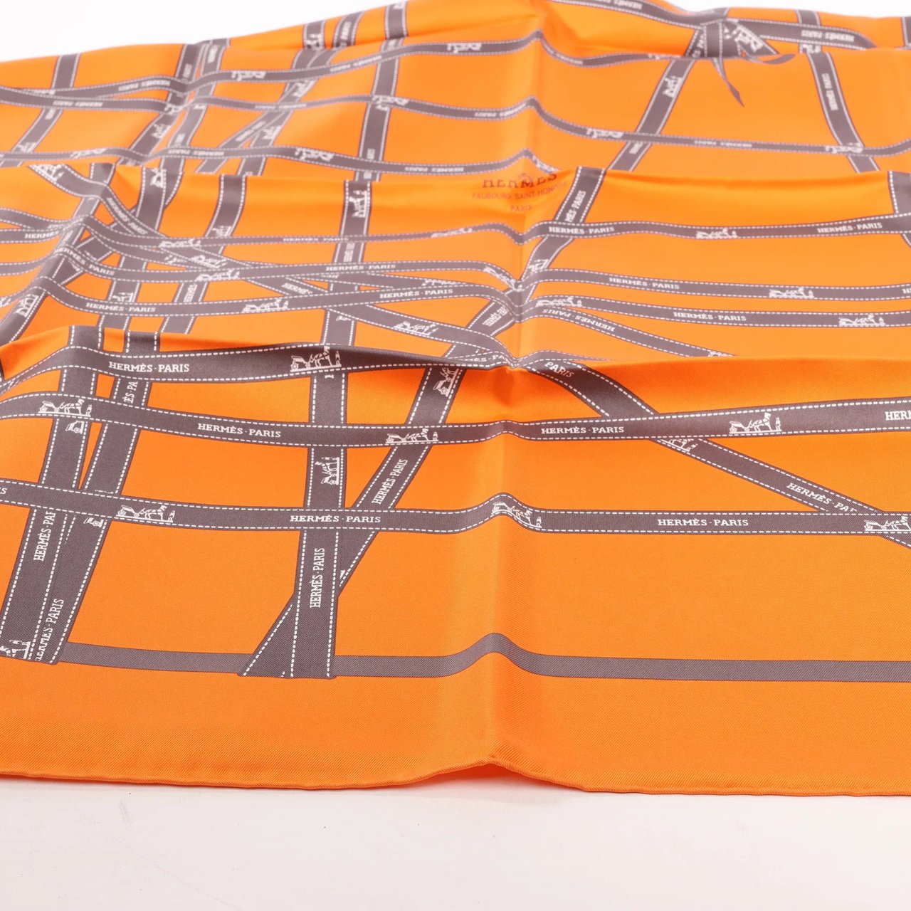 Hermès Hermès Carré 90 "Bolduc Ribbon" Silk handkerchief in Orange Oranje
