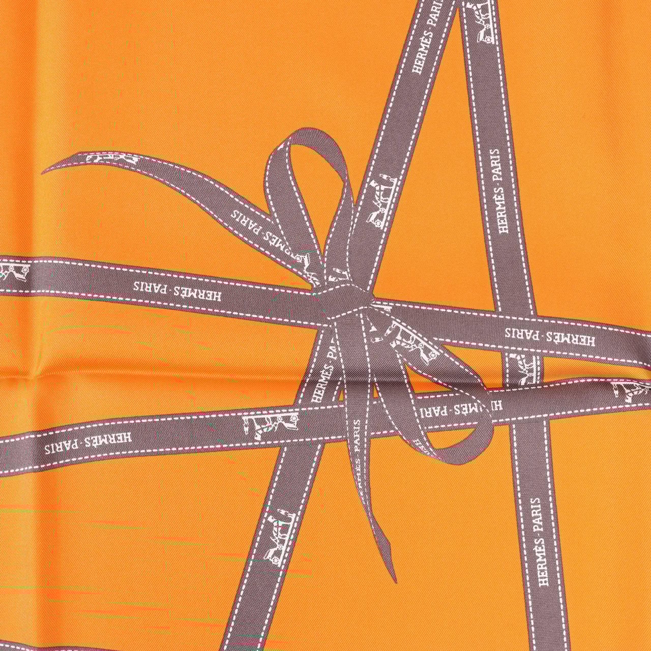 Hermès Hermès Carré 90 "Bolduc Ribbon" Silk handkerchief in Orange Oranje