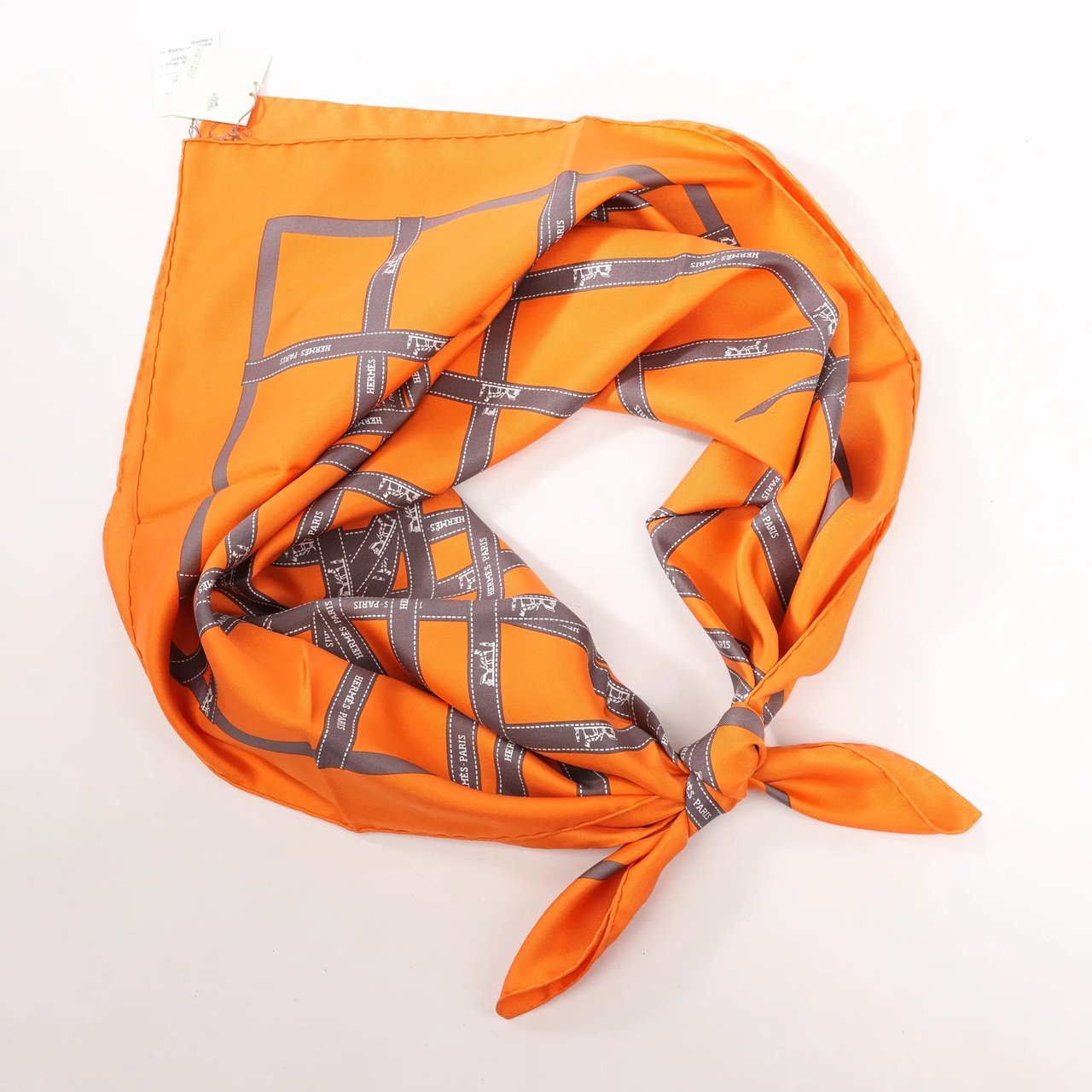 Hermès Hermès Carré 90 "Bolduc Ribbon" Silk handkerchief in Orange Oranje