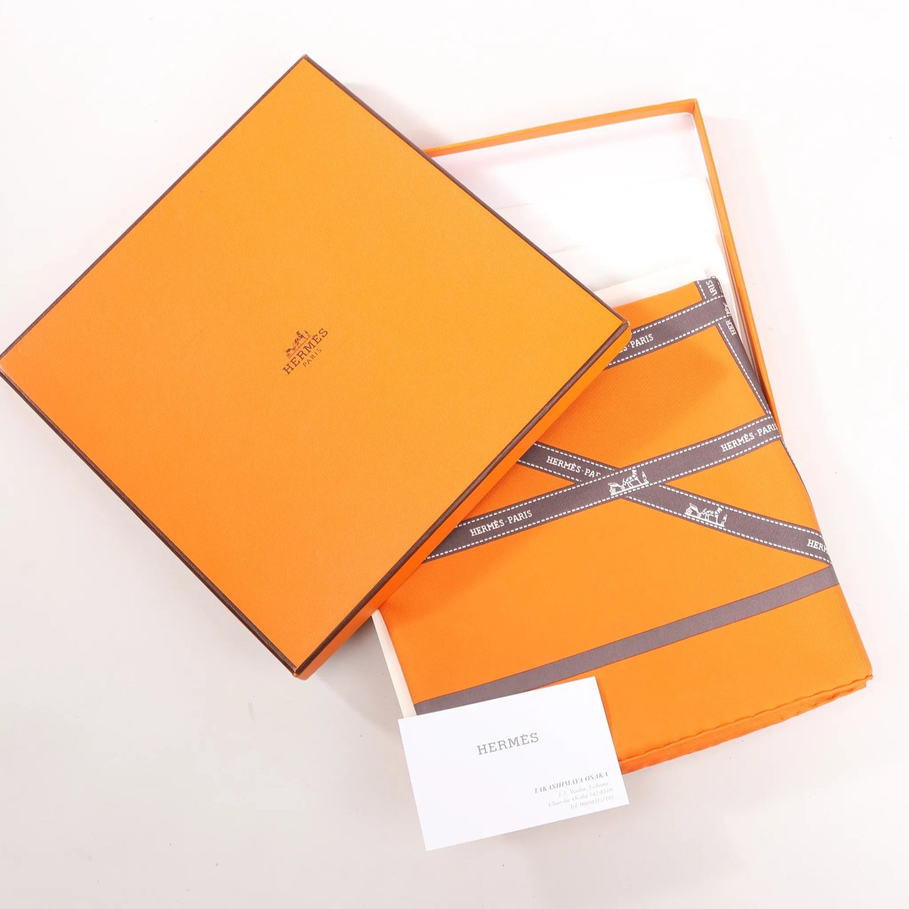 Hermès Hermès Carré 90 "Bolduc Ribbon" Silk handkerchief in Orange Oranje