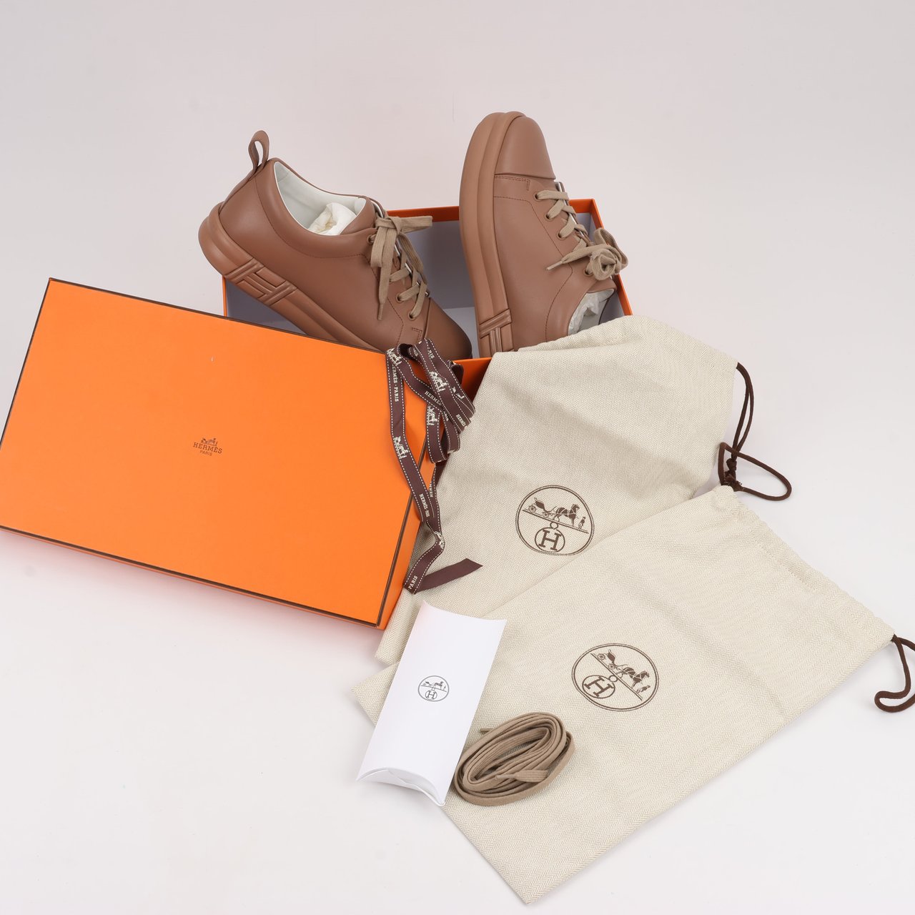Hermès Hermès Happy Leather Sneakers in Brown, Size 39 Bruin