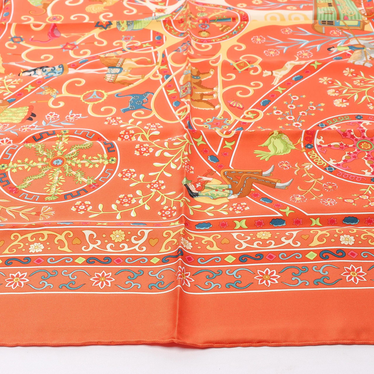 Hermès Hermès Carré 90 "Peuple du Vent" Silk handkerchief in Orange Oranje