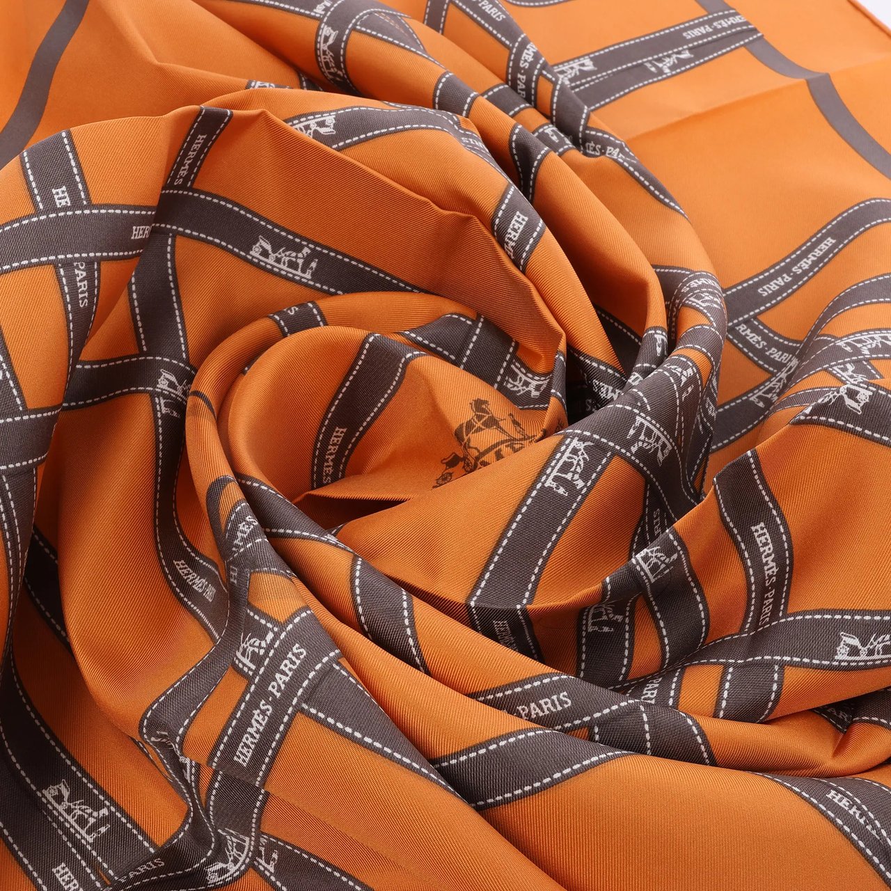 Hermès Hermès Carré 90 "Bolduc Ribbon" Silk handkerchief in Orange Oranje