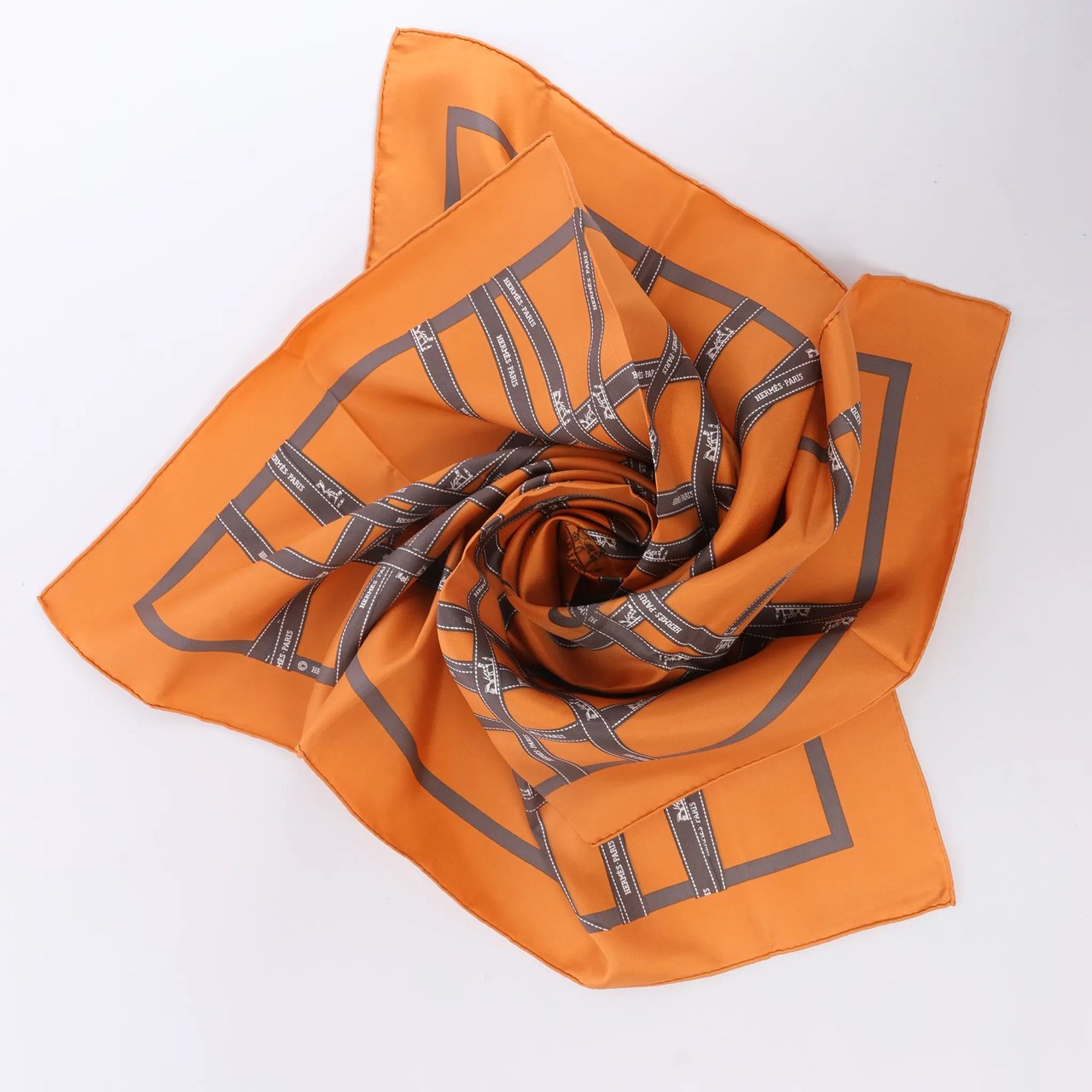 Hermès Hermès Carré 90 "Bolduc Ribbon" Silk handkerchief in Orange Oranje