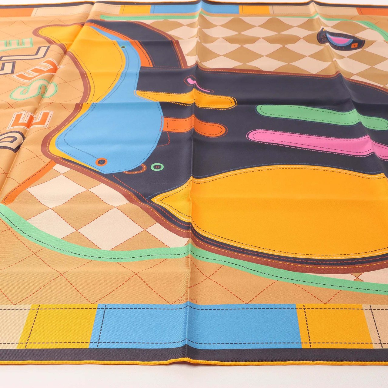 Hermès Carré 90 Double Face "Tapis de Selle" Silk handkerchief in Orange Oranje