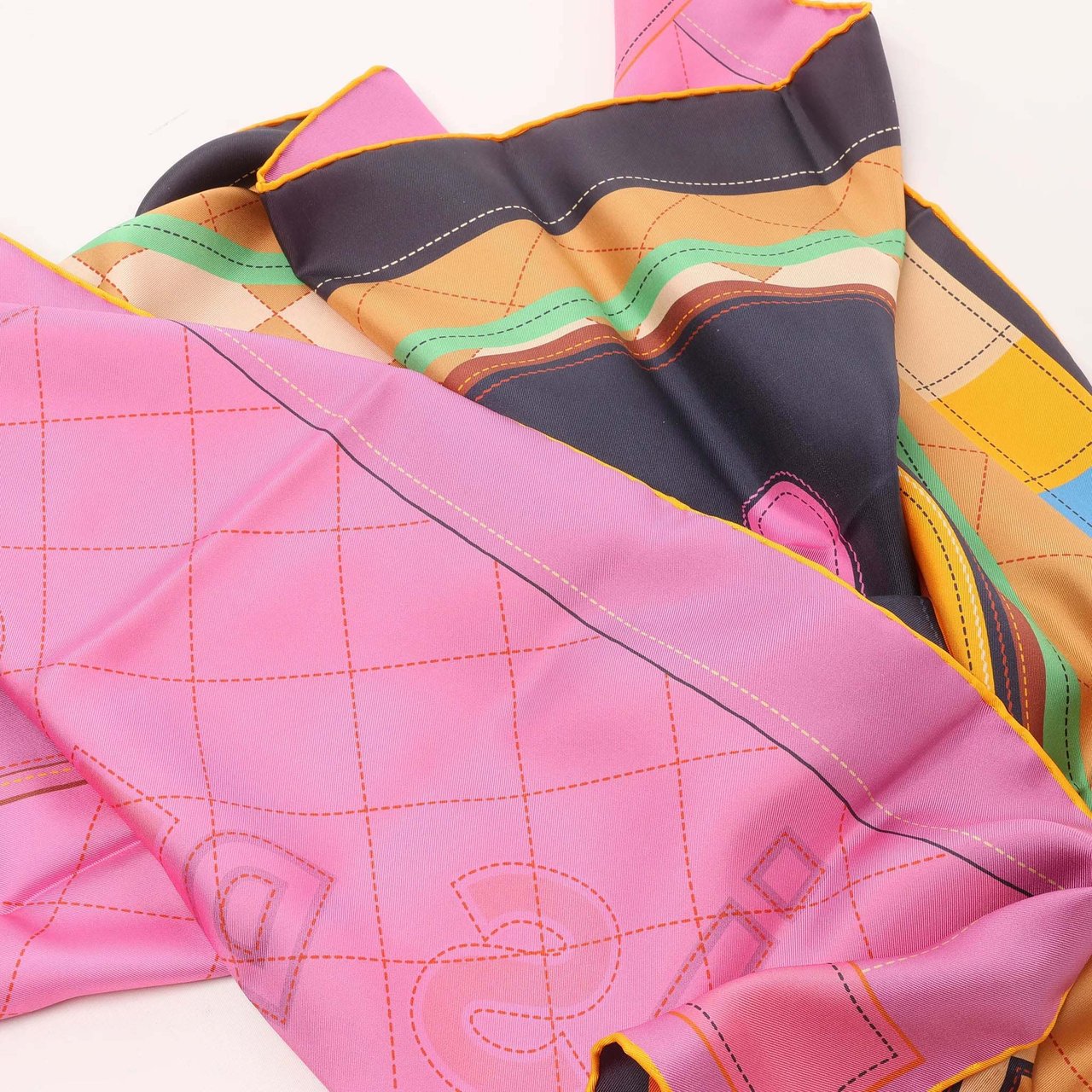 Hermès Carré 90 Double Face "Tapis de Selle" Silk handkerchief in Orange Oranje