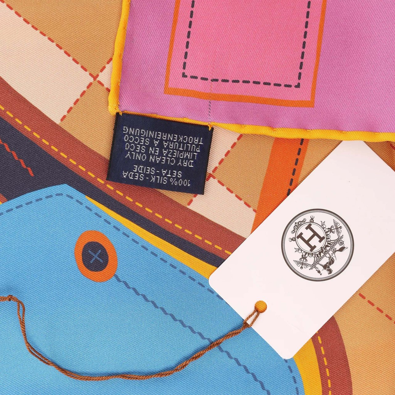 Hermès Carré 90 Double Face "Tapis de Selle" Silk handkerchief in Orange Oranje