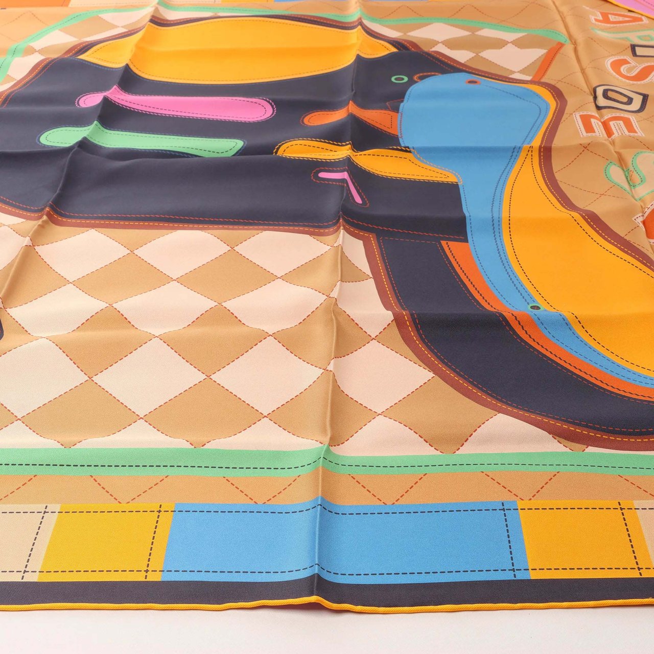 Hermès Carré 90 Double Face "Tapis de Selle" Silk handkerchief in Orange Oranje