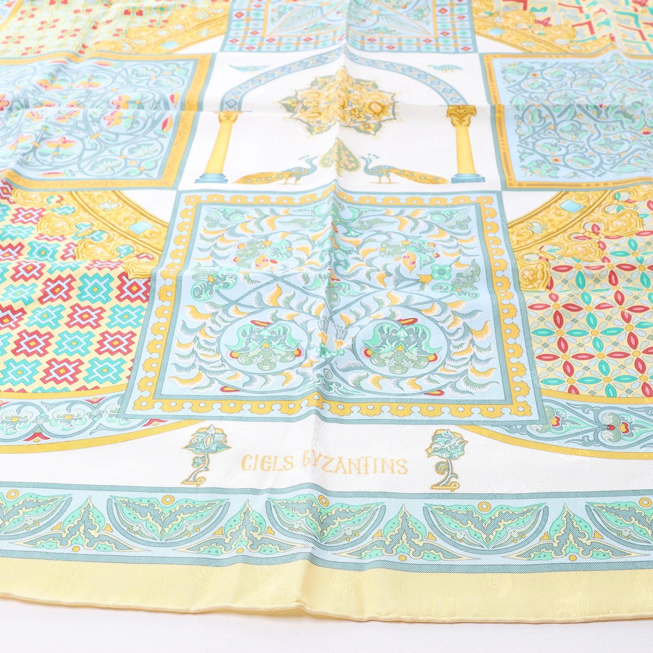 Hermès Carré 90 "CIELS BYZANTINS" Silk handkerchief in Yellow Geel