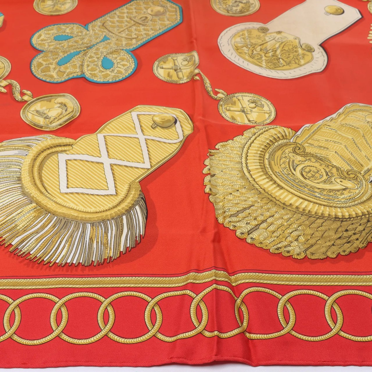 Hermès Carré 90 "Epaulettes" Silk handkerchief in Red Divers