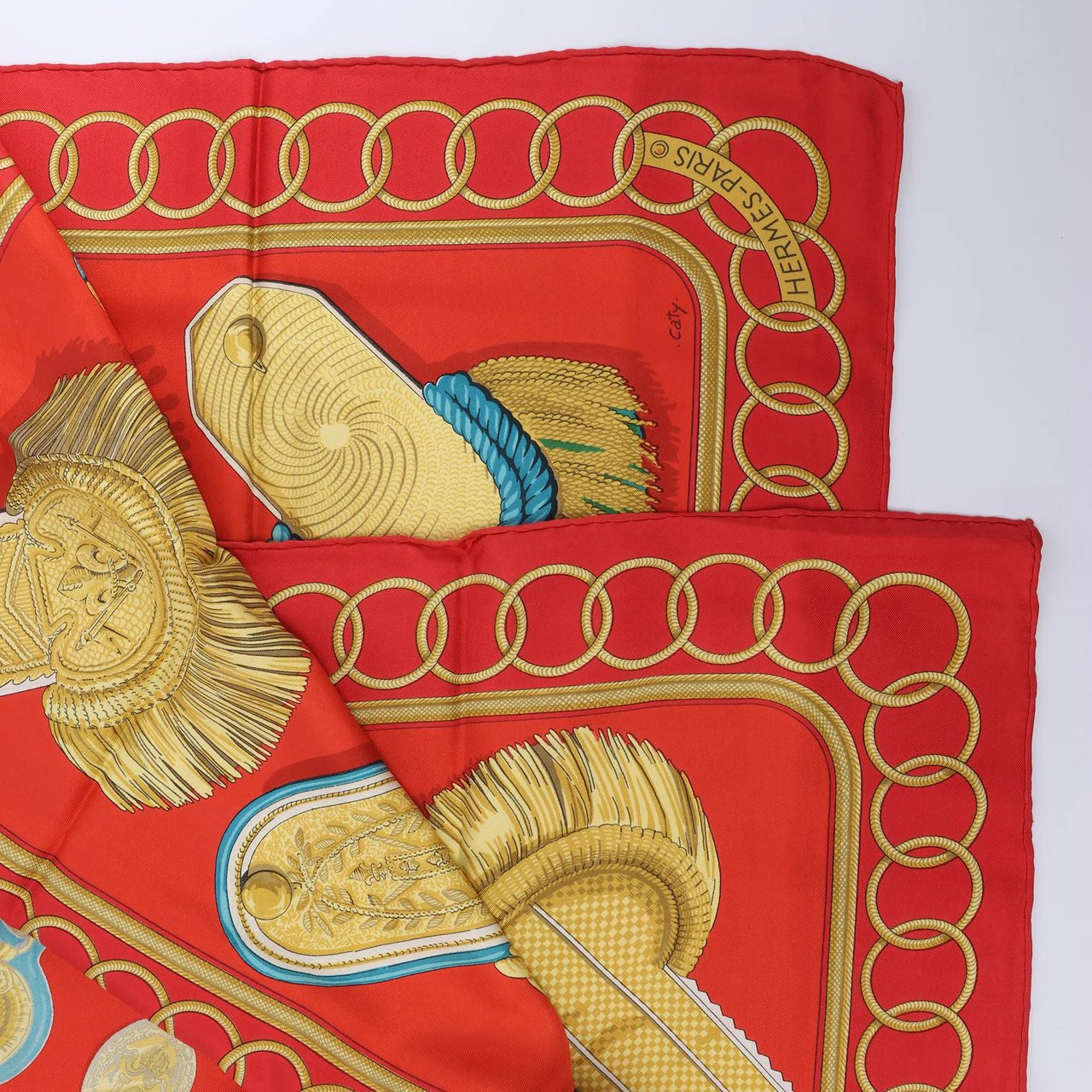 Hermès Carré 90 "Epaulettes" Silk handkerchief in Red Divers