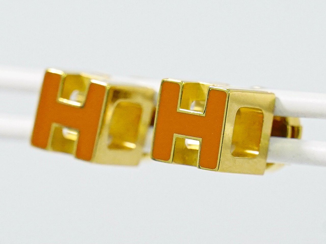 Hermès Hermes Cage d'H Stud Earrings Plated Metal with Enamel Goud