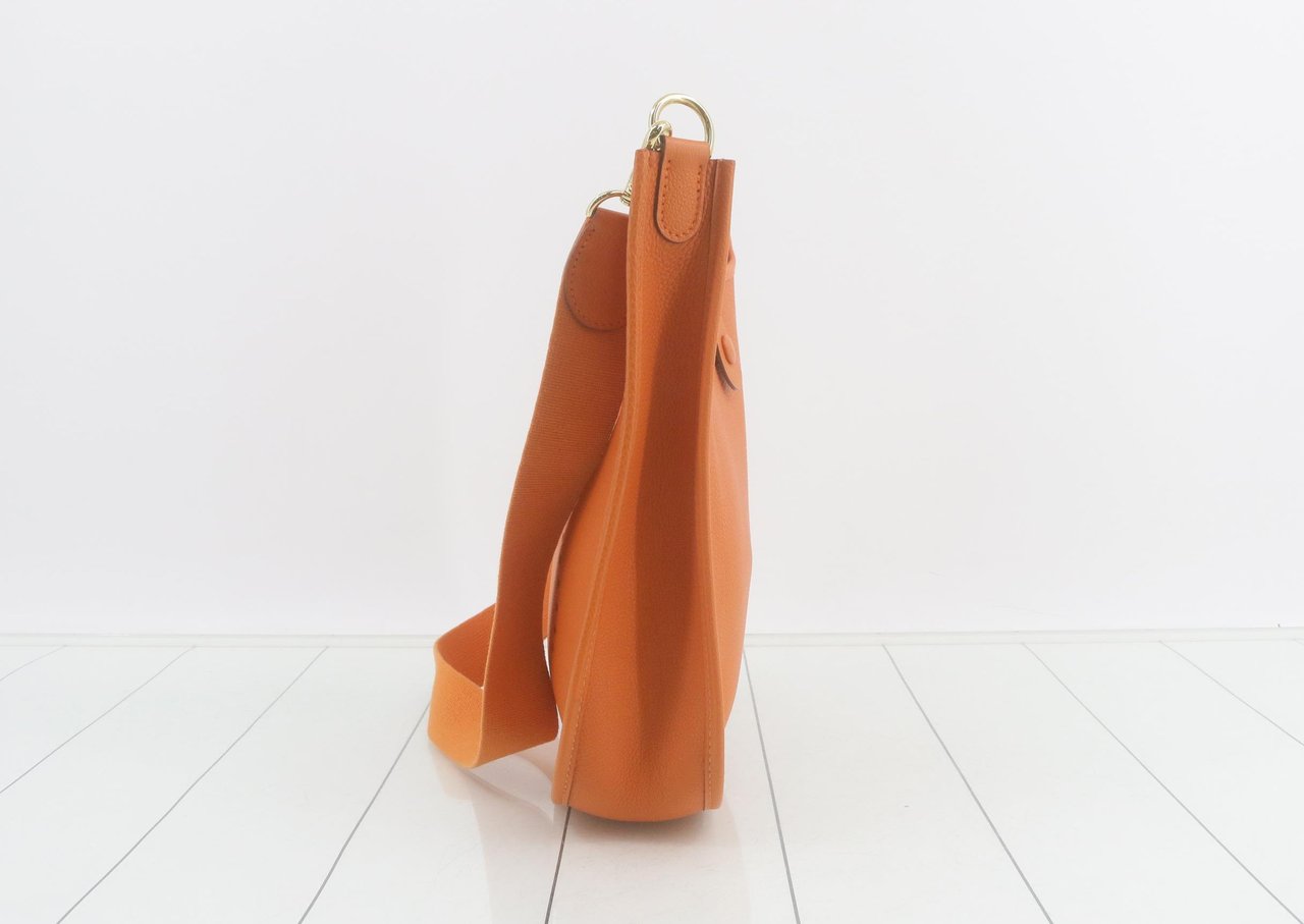 Hermès Hermes Evelyne Bag Gen II Clemence GM Oranje