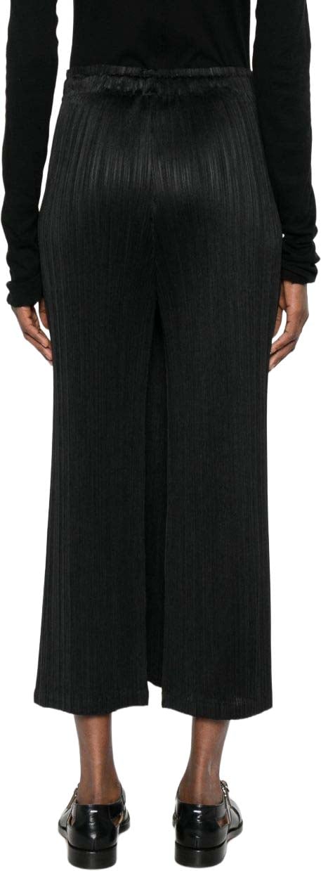 HOMME PLISSÉ ISSEY MIYAKE Trousers Black Zwart