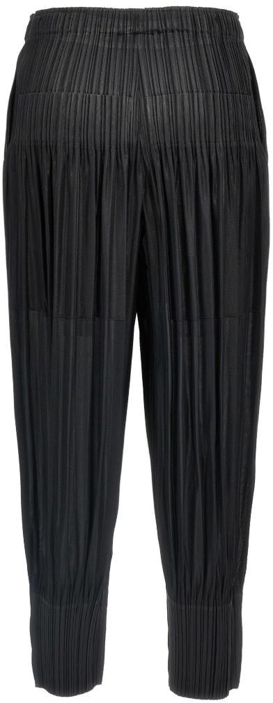 HOMME PLISSÉ ISSEY MIYAKE Trousers Black Zwart