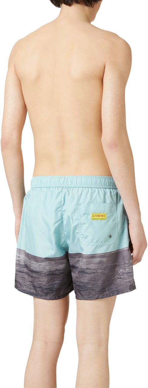 Iceberg Patterned swim trunks with sage green Background and yellow drawstring Groen