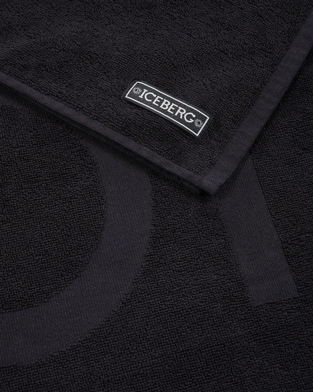 Iceberg Black beach towel featuring a contrasting logo Zwart