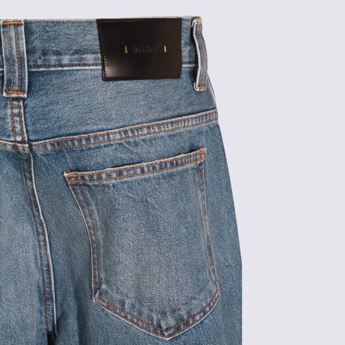 Khaite Mid-Blue Straight-Leg Jeans with Subtle Fading and Distressed Hems Blauw