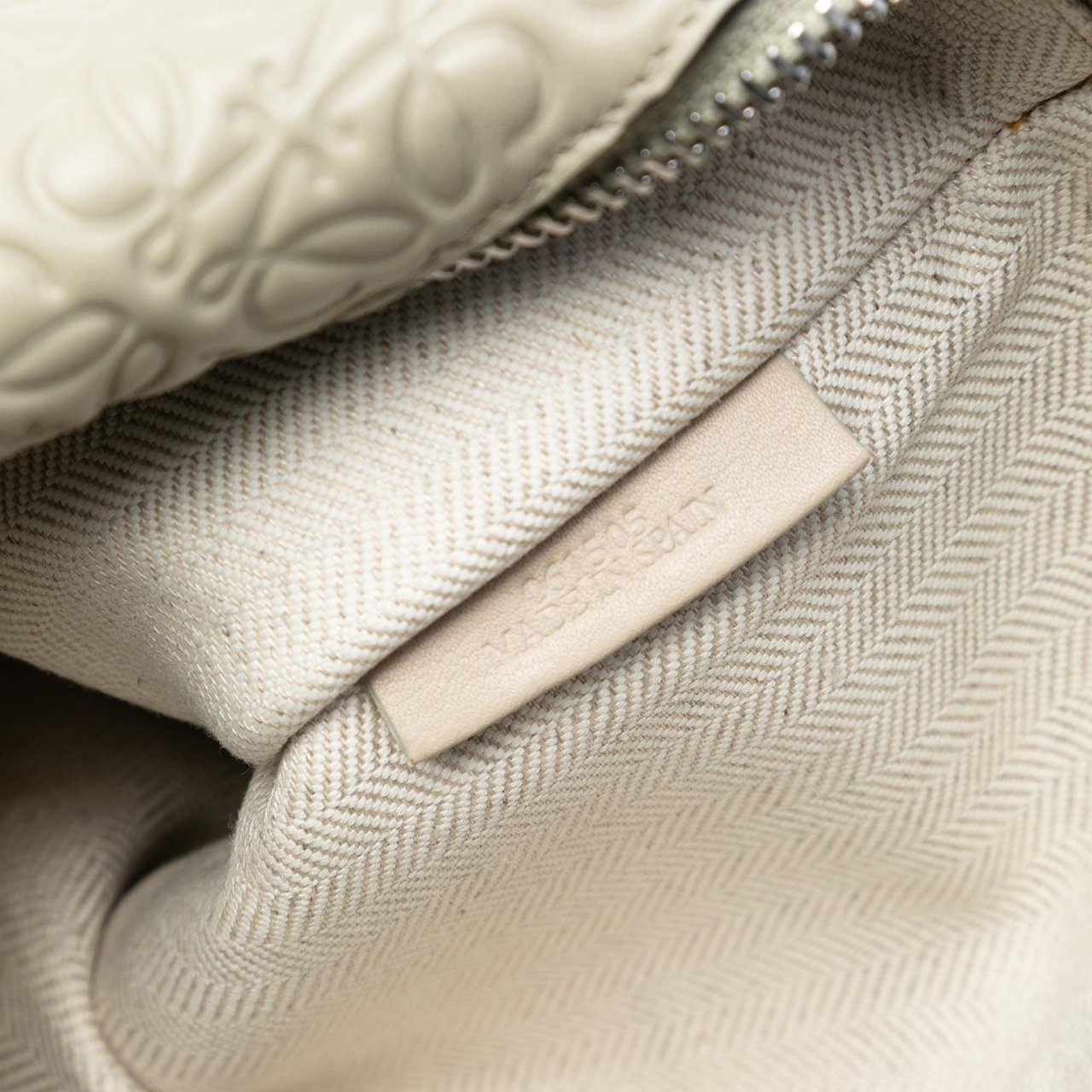 Loewe Embossed Leather Anagram Repeat T Clutch Bruin