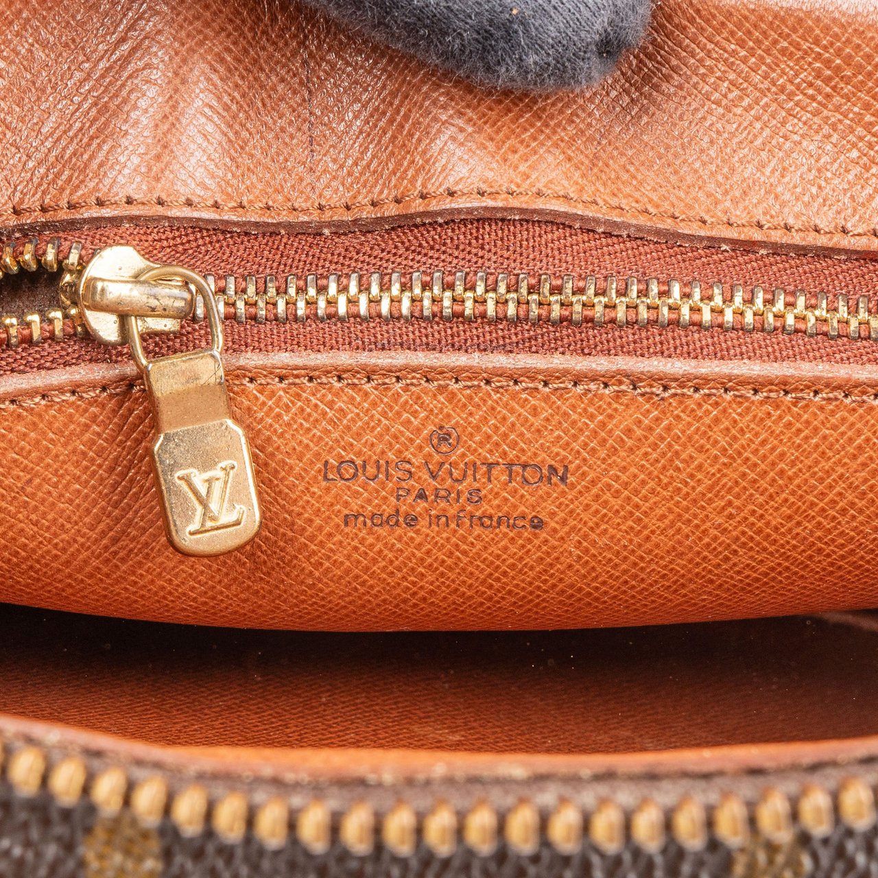 Louis Vuitton Louis Vuitton Canvas Monogram Marly Dragonne GM Clutch Bruin