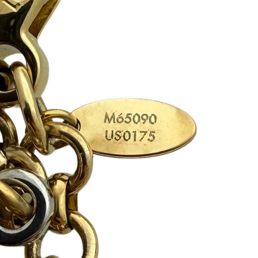 Louis Vuitton Louis Vuitton Tapage Three Tone Taschenanhänger Gold / neuwertig Goud