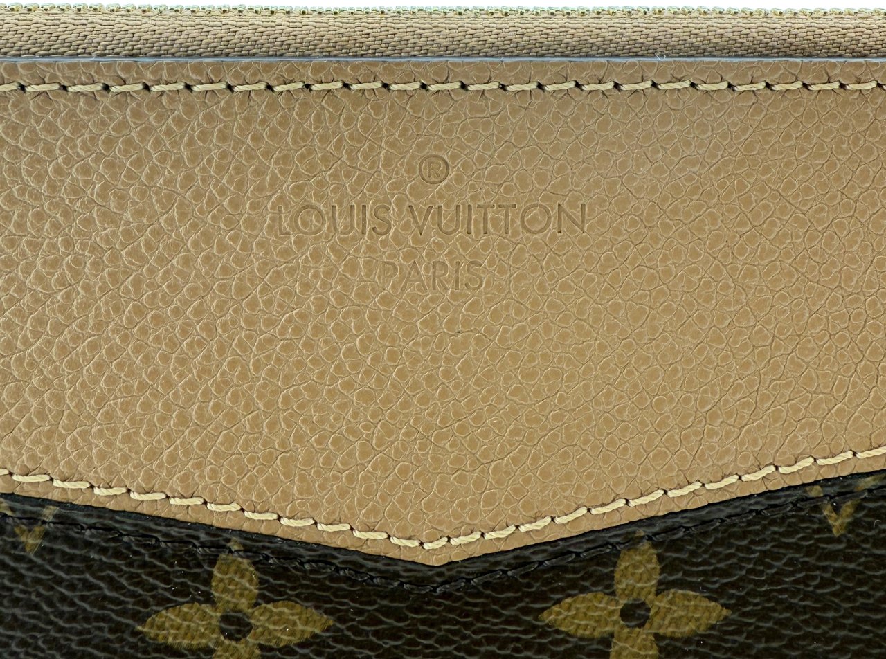 Louis Vuitton Louis Vuitton Daily Pouch Sesame Monogram Canvas Braun / neuwertig Bruin