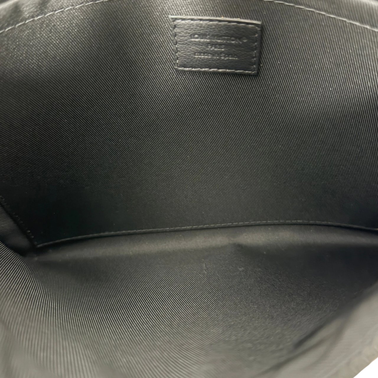 Louis Vuitton Pochette To-Go Monogram Shadow Leder Zwart