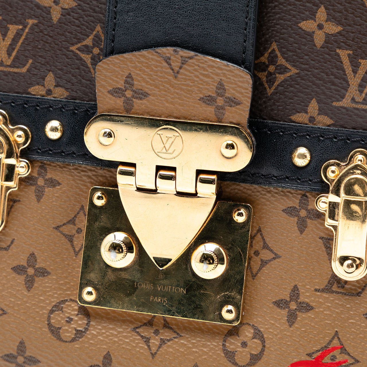 Louis Vuitton Monogram Reverse Trunk Clutch Bruin