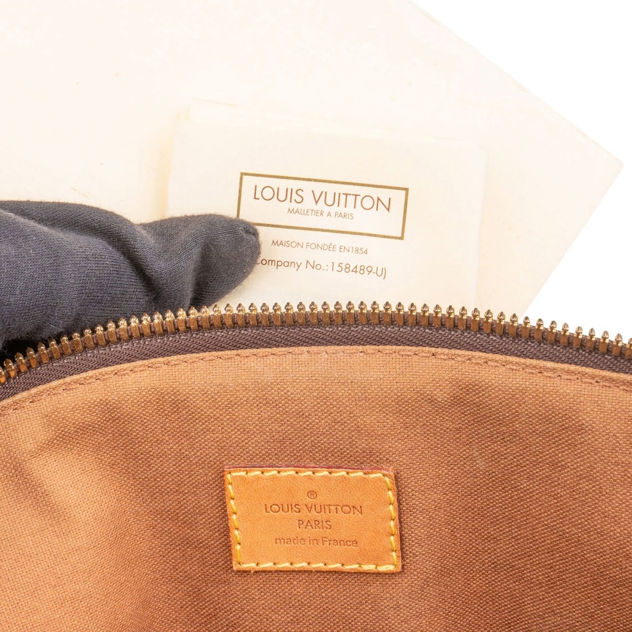 Louis Vuitton Louis Vuitton Monogram Canvas Tivoli GM Handbag Bruin