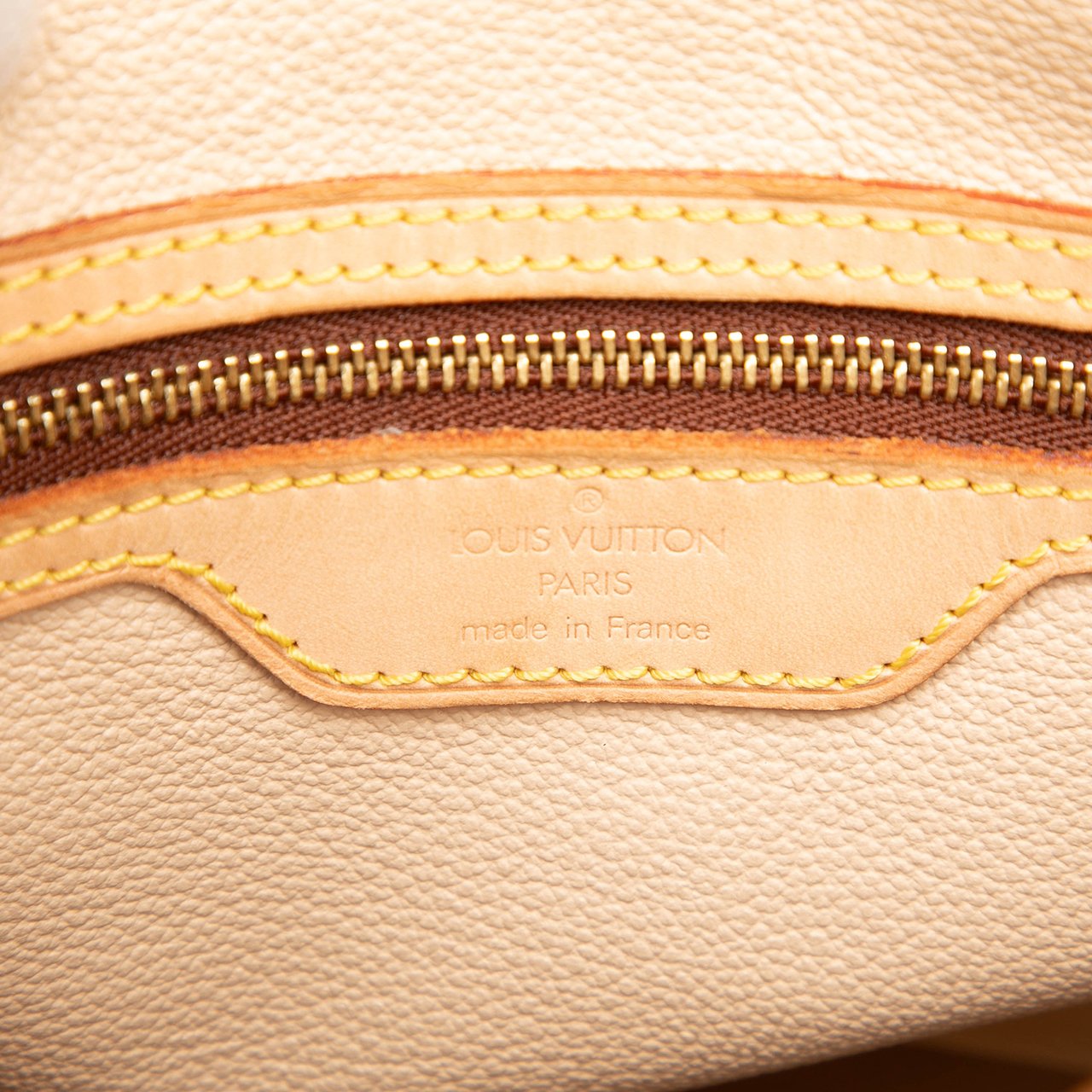 Louis Vuitton Monogram Petit Bucket Bruin