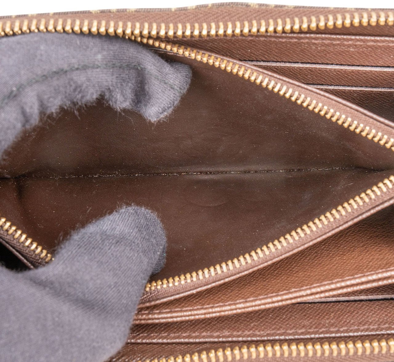 Louis Vuitton Mini Lin Monogram Zippy Wallet Bruin
