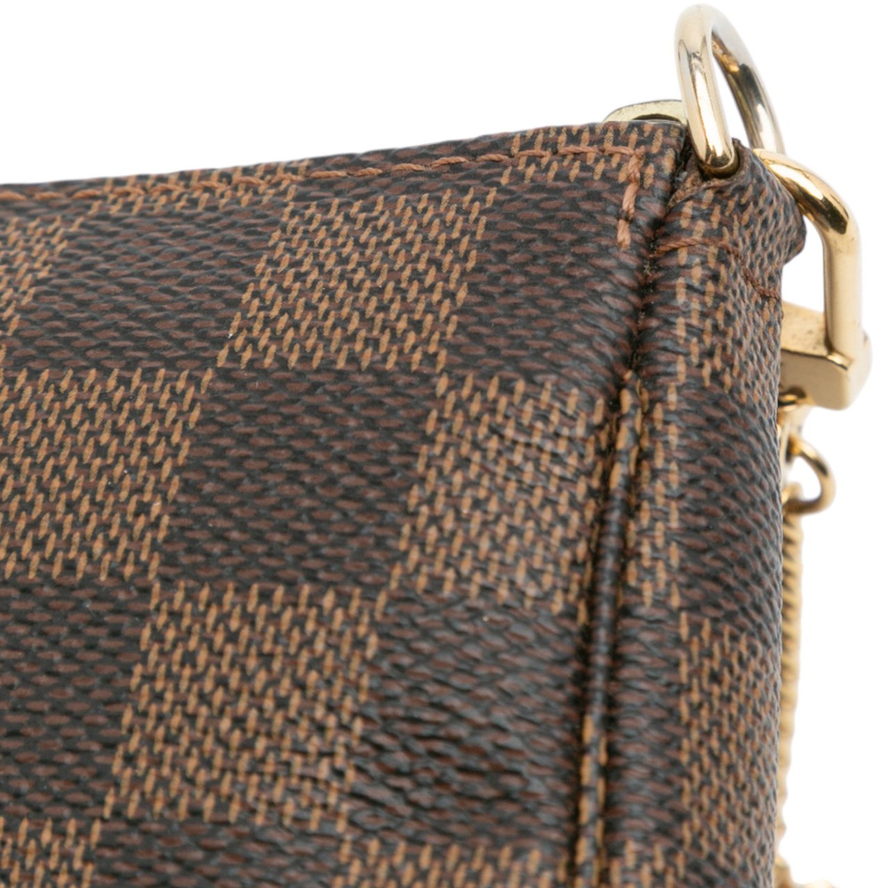 Louis Vuitton Damier Ebene Illustre Mini Pochette Accessories Bruin