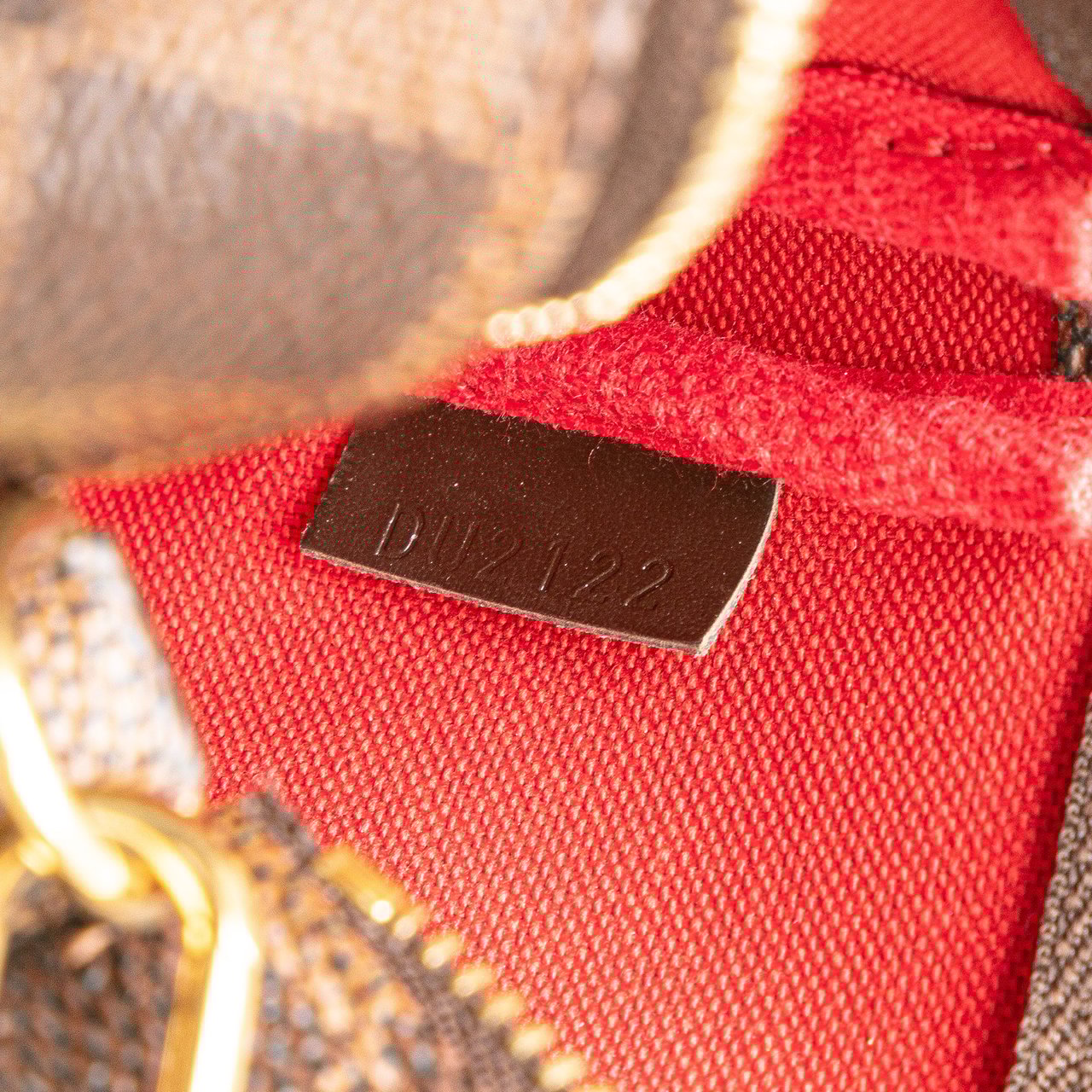 Louis Vuitton Damier Ebene Mini Pochette Accessoires Bruin