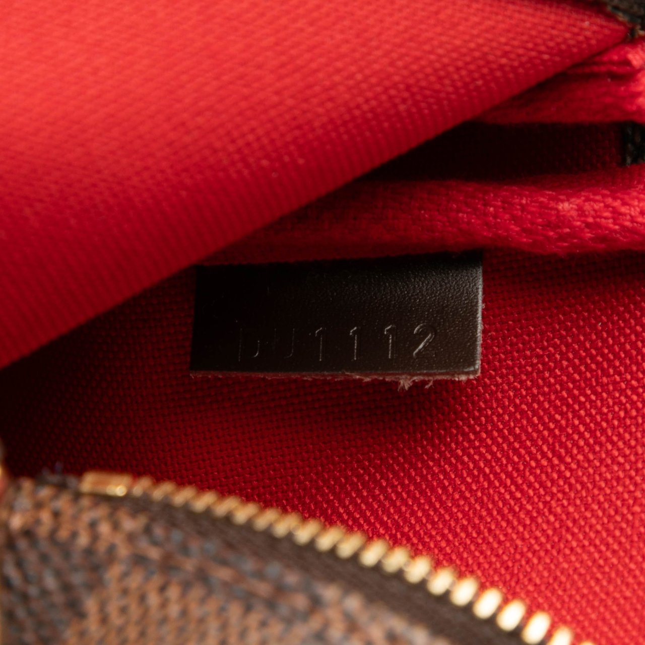 Louis Vuitton Damier Ebene Mini Pochette Accessoires Bruin