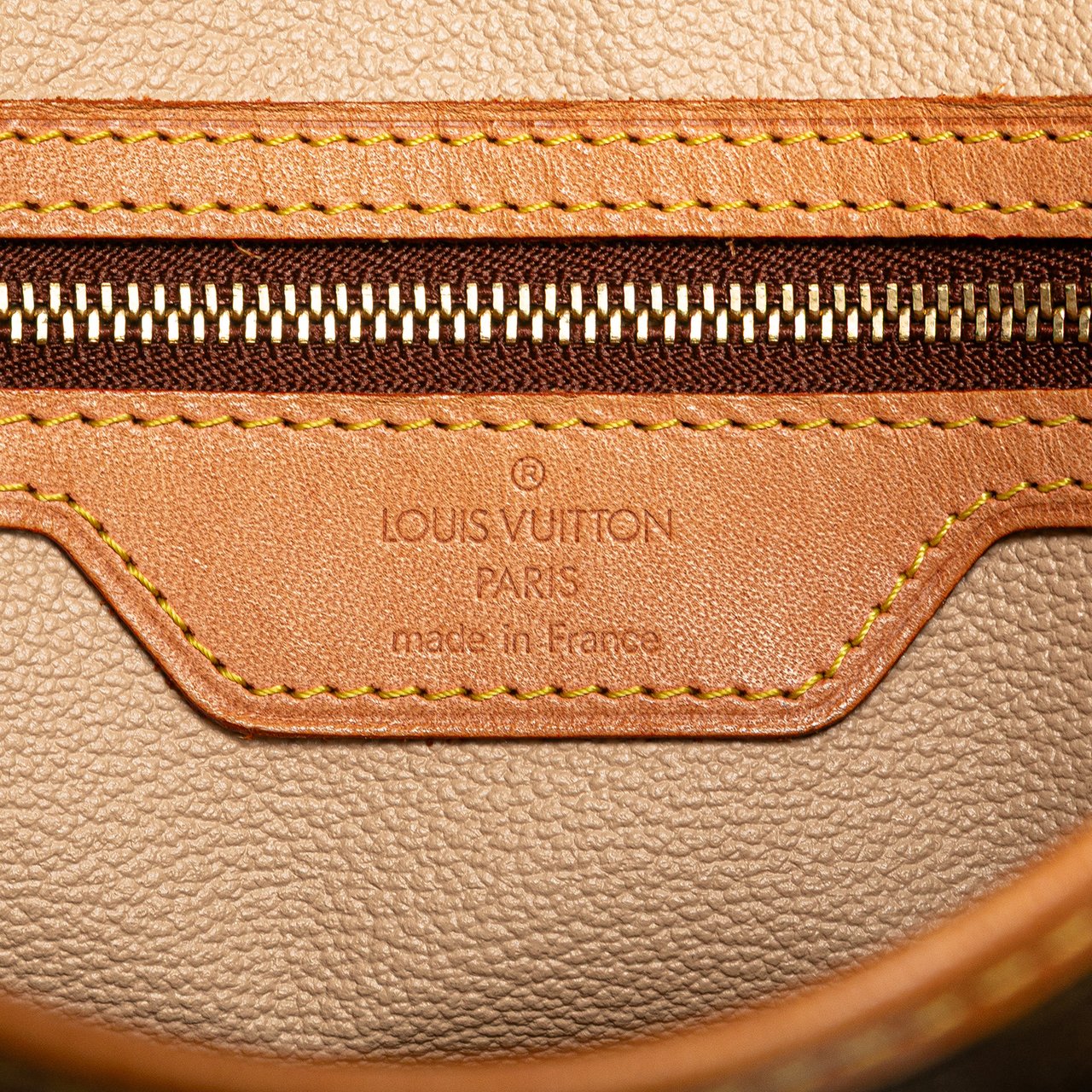 Louis Vuitton Monogram Petit Bucket Bruin