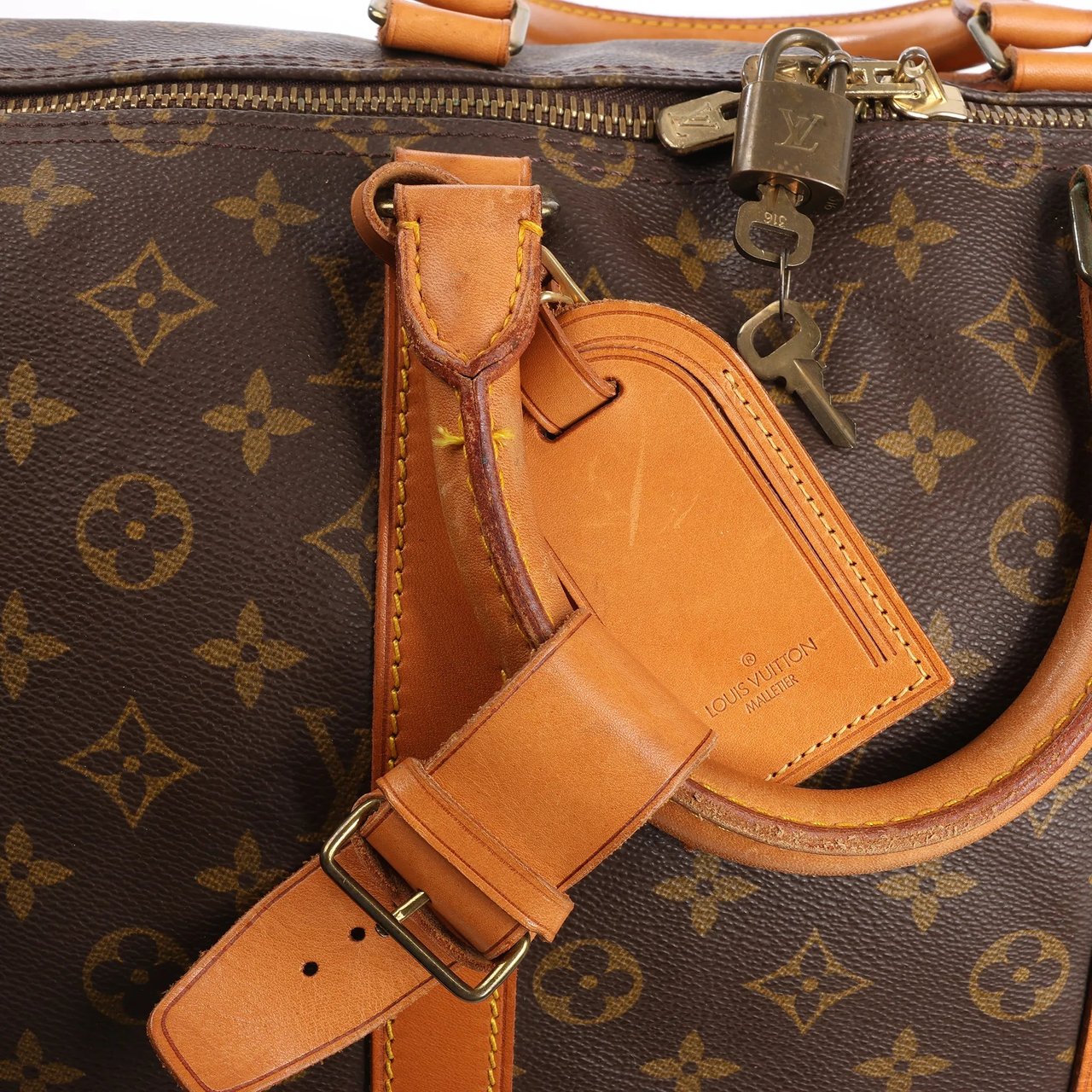 Louis Vuitton Louis Vuitton Monogram Canvas Keepall Bandoulière 55 Travel Bag M41414 Bruin