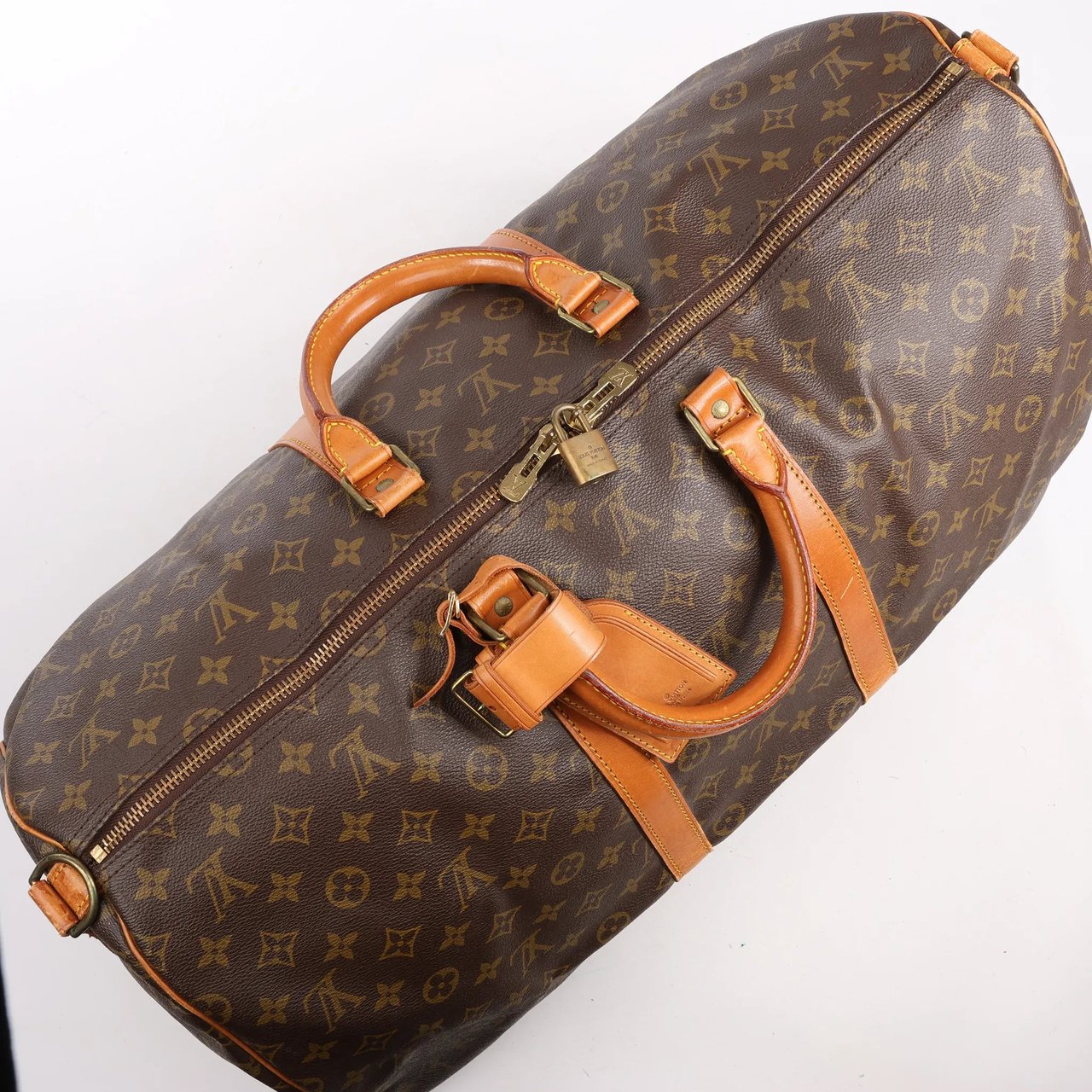Louis Vuitton Louis Vuitton Monogram Canvas Keepall Bandoulière 55 Travel Bag M41414 Bruin